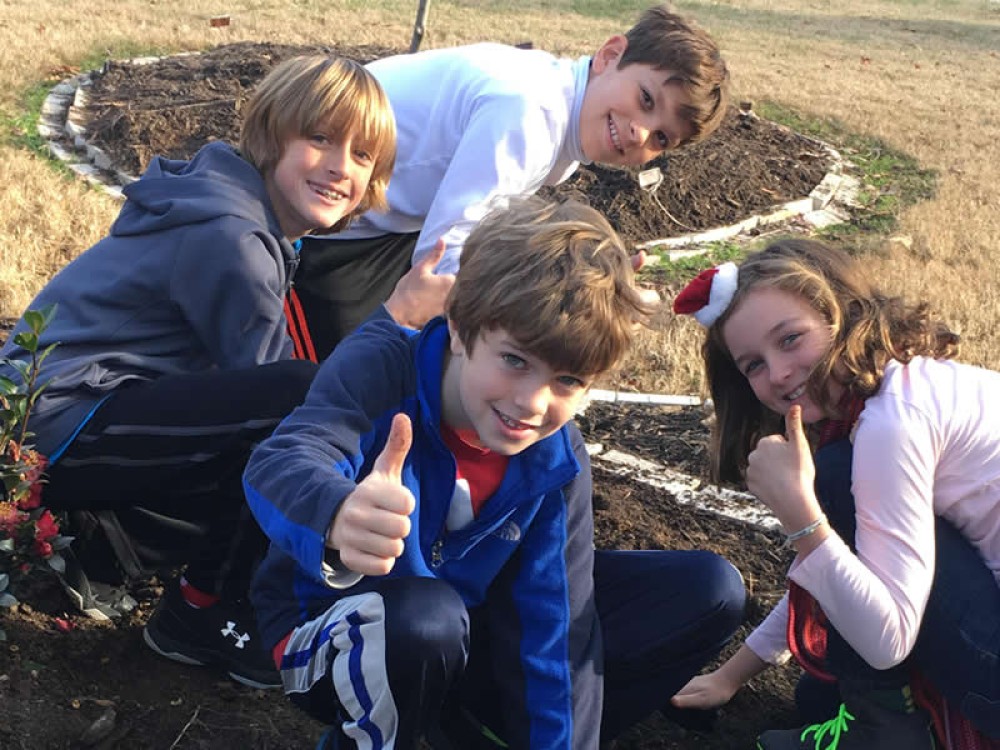 Photo of students in the garden