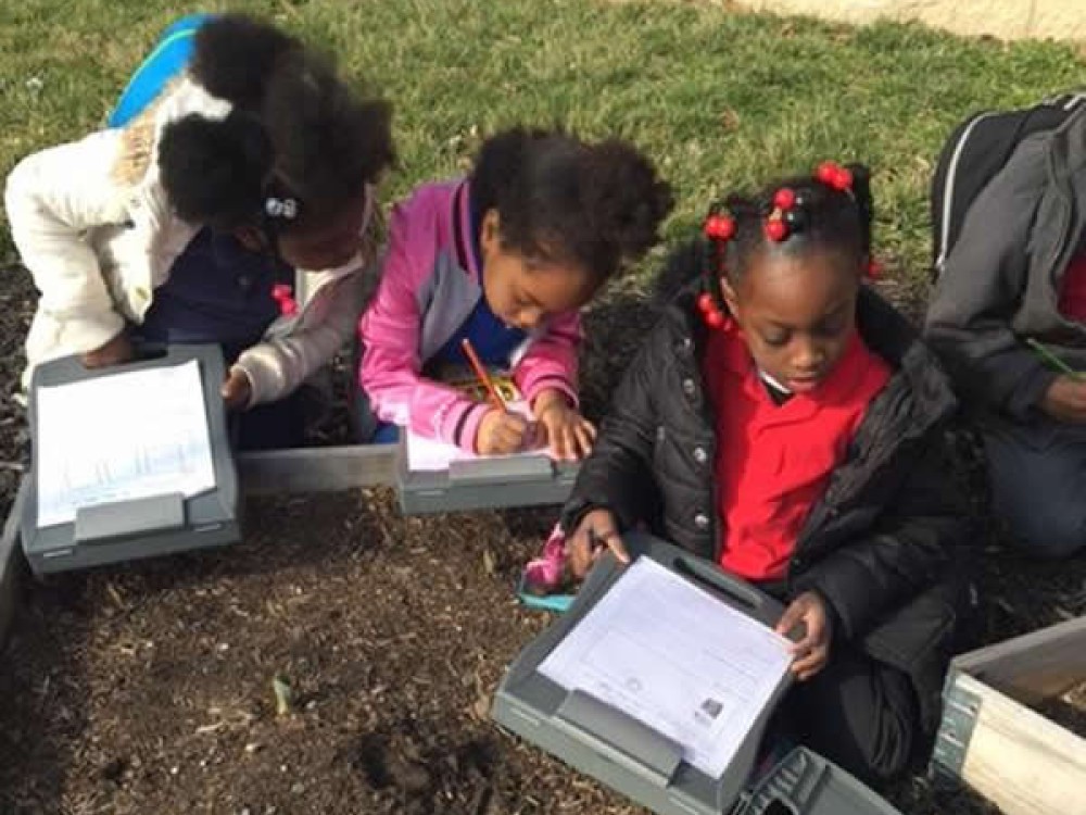 Photo of a student in the garden